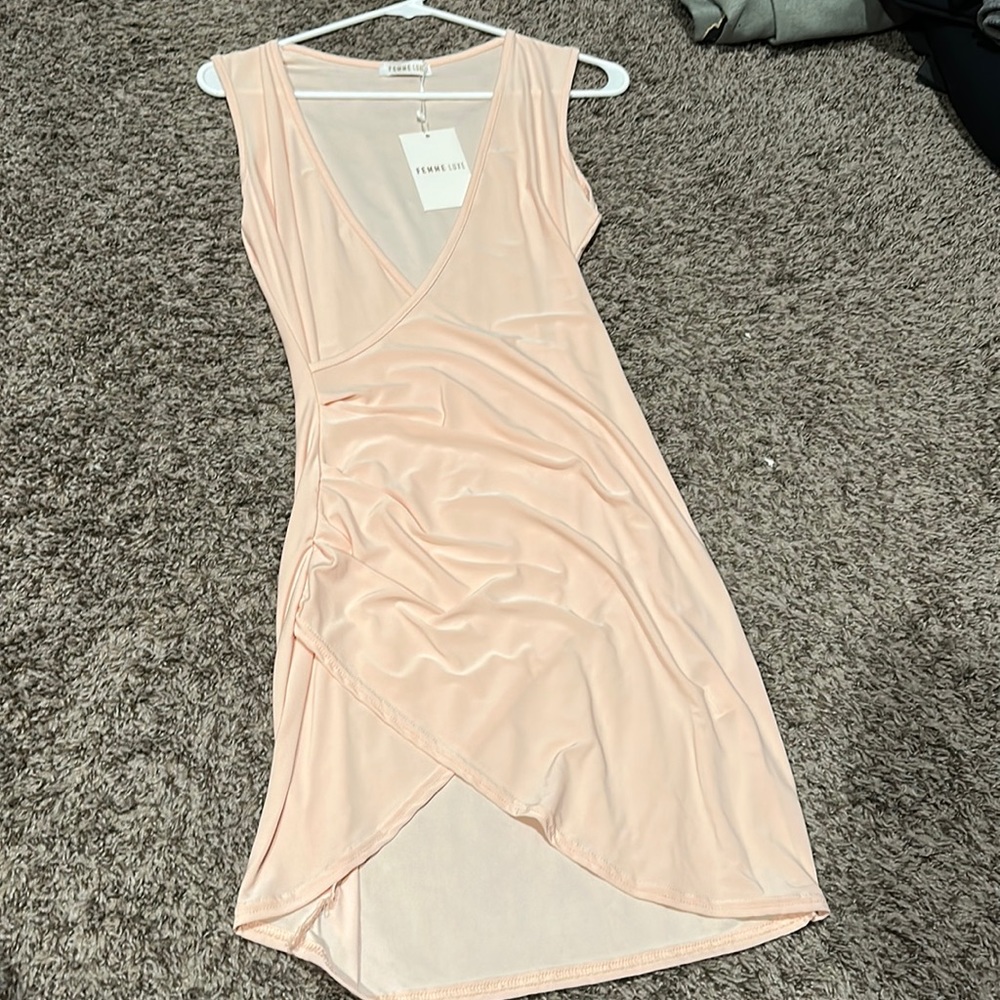 Never worn! Beautiful mini dress! Super flattering